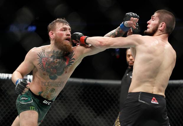 Conor punches Khabib