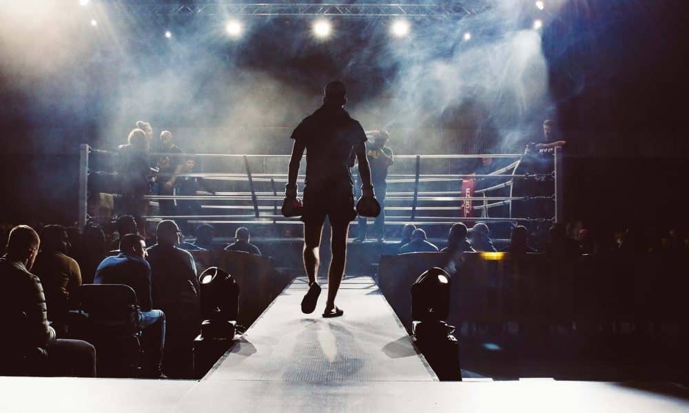 Man walking into a boxing ring